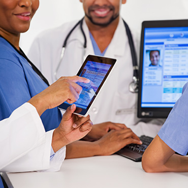 professional looking at digital medical records
